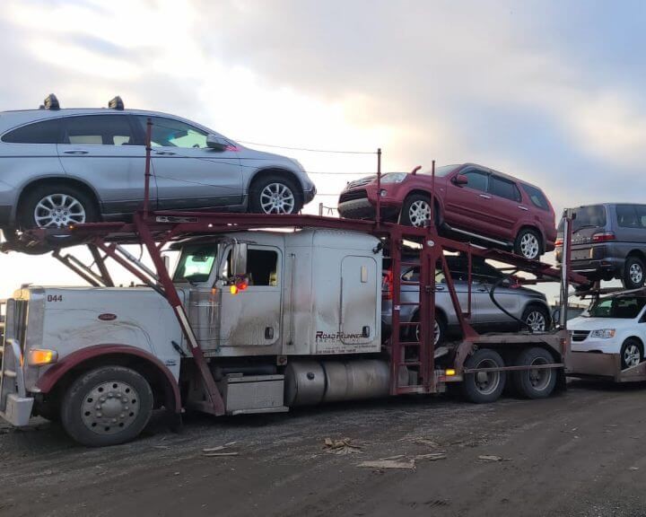 Truck transporting automobiles - Automobile shipping from Alberta