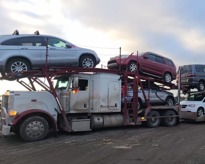 Truck transporting automobiles - Automobile shipping from Victoria to Winnipeg